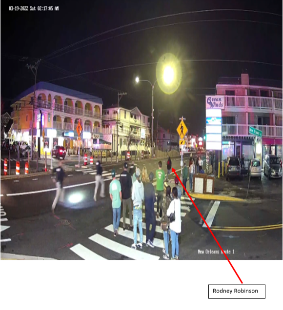 A Dewey Beach Town camera located at the intersection of Coastal Highway and New Orleans St. also recorded footage of Robinson being pursued by Dewey Beach PD Officers. (Note: The Dewey Beach camera time is off by one hour from the Starboard security cameras due to a daylight saving time adjustment discrepancy.)