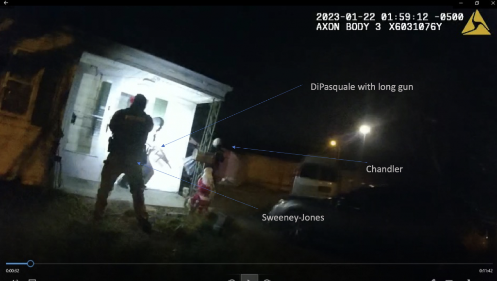 Body worn camera screenshot showing DiPasquale with long gun, Chandler, and Sweeney-Jones